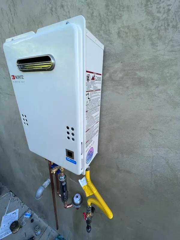 Tankless water heater installation for Clarke Farms homes